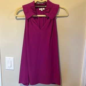 Magenta loose fitting /flowy sleeveless top.